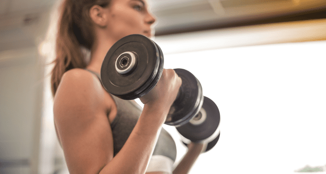 woman with dumbbells